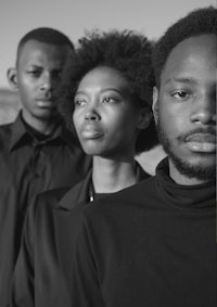 a black and white photo of a group of people